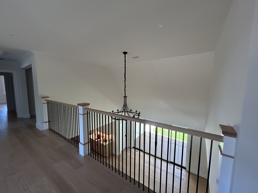 12 Cranberry Mdw Way North Reading, MA 01864 - Photo 13 of 35 a view of hallway with wooden floor
