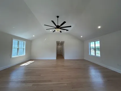 a bathroom with a tub and a shower