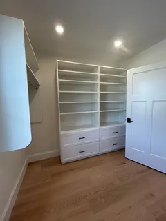 a bathroom with a shower and a sink