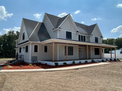 a front view of house with yard