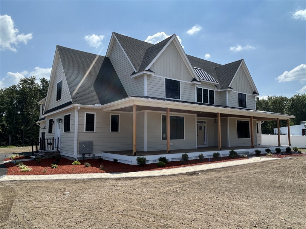 12 Cranberry Mdw Way North Reading, MA 01864 - Photo 2 of 35 a front view of house with yard