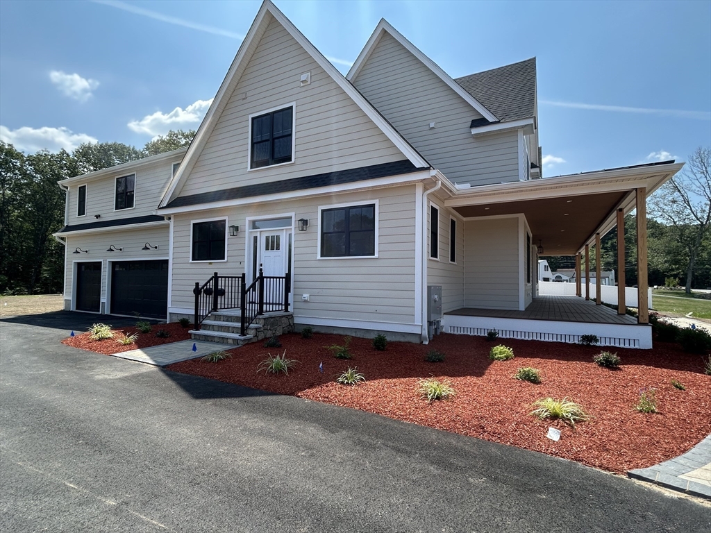 12 Cranberry Mdw Way North Reading, MA 01864 - Photo 3 of 35 a view of a house with roof and sitting area