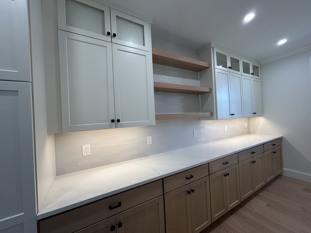 12 Cranberry Mdw Way North Reading, MA 01864 - Photo 35 of 35 a kitchen with a sink and cabinets