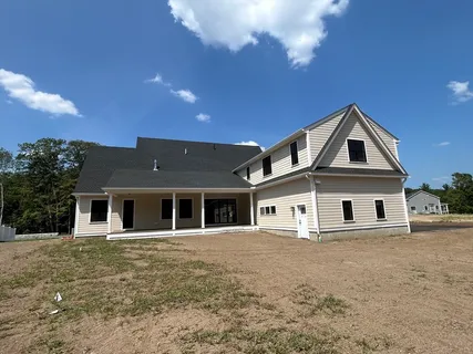 a front view of a house with a porch