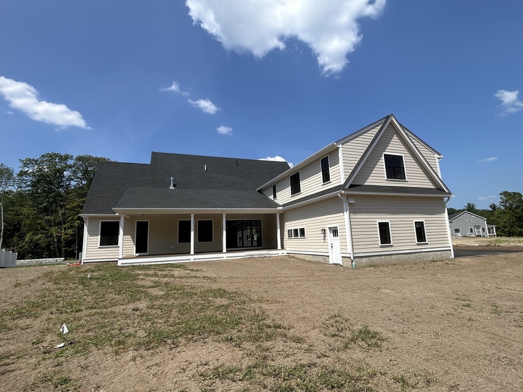 12 Cranberry Mdw Way North Reading, MA 01864 - Photo 4 of 35 a front view of a house with a porch