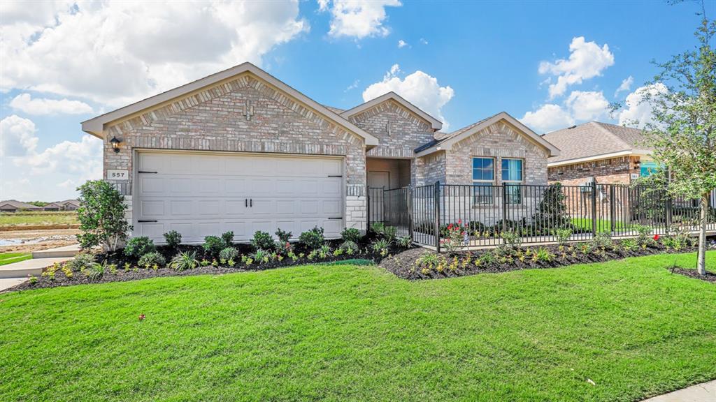 557 Marsh Street Cleburne, TX 76033 - Photo 37 of 40 a front view of a house with garden