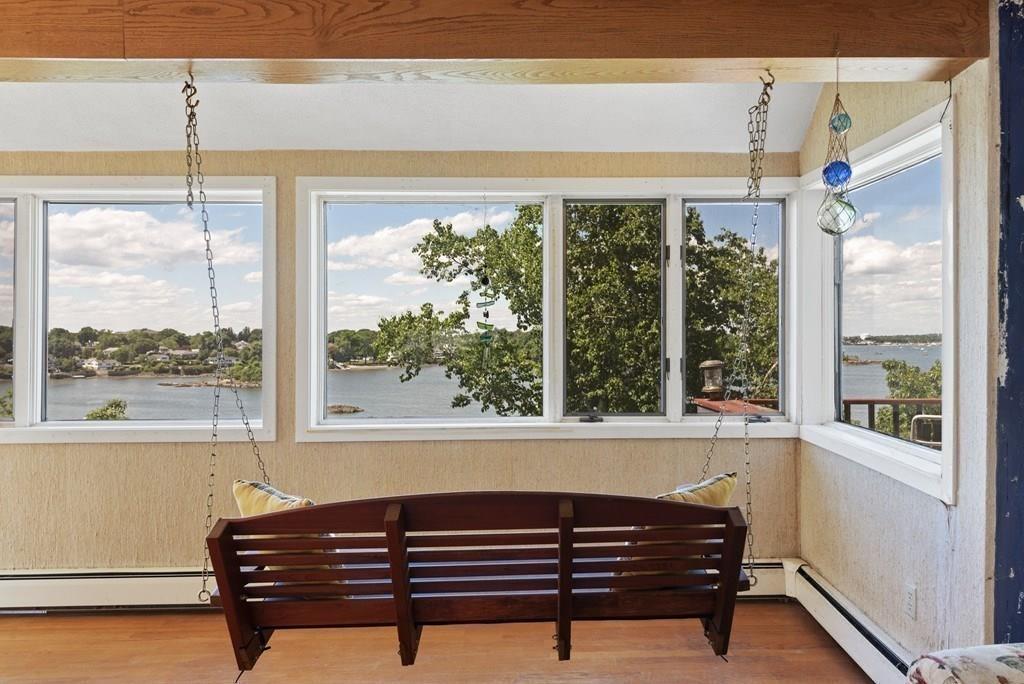 50 Pinecliff Drive Marblehead, MA 01945 - Photo 13 of 41 a living room with a large window and couch