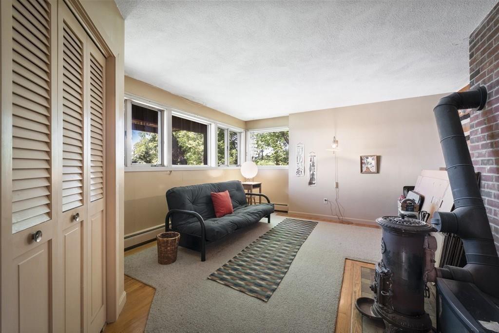 50 Pinecliff Drive Marblehead, MA 01945 - Photo 21 of 41 a living room with furniture and a window
