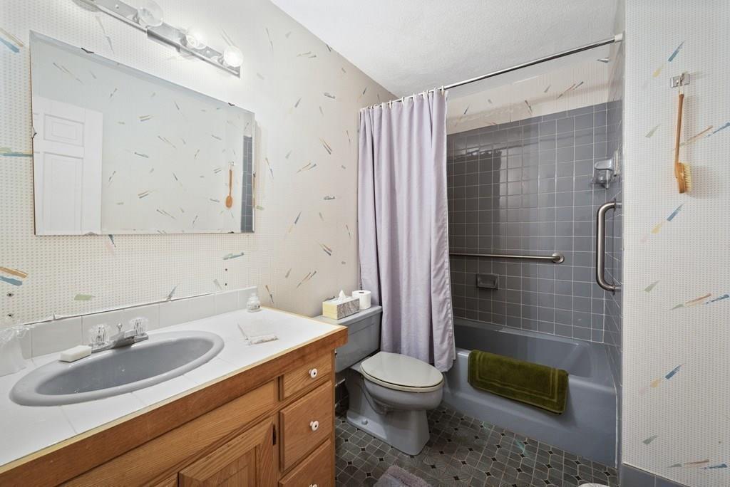 50 Pinecliff Drive Marblehead, MA 01945 - Photo 23 of 41 a bathroom with a sink a toilet and shower