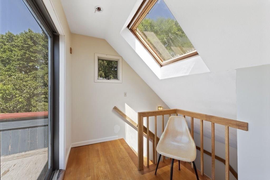 50 Pinecliff Drive Marblehead, MA 01945 - Photo 31 of 41 a view of a hallway with wooden floor and stairs