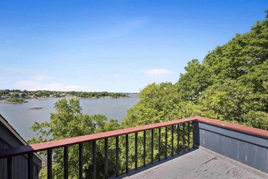 50 Pinecliff Drive Marblehead, MA 01945 - Photo 34 of 41 a balcony with an ocean view