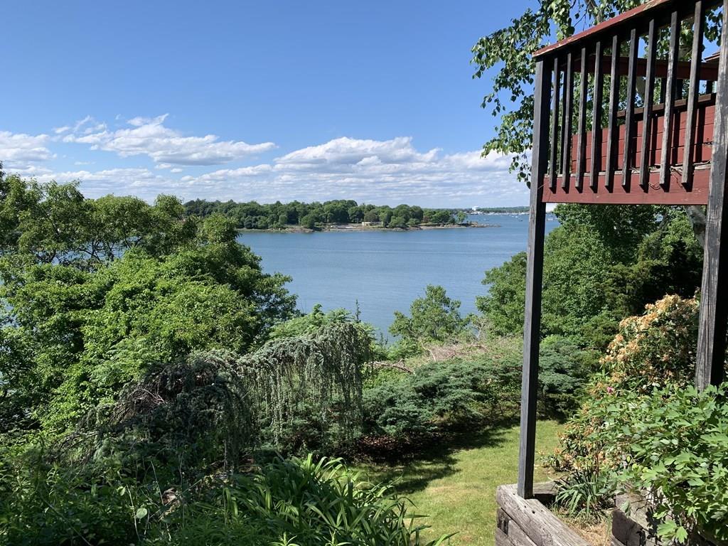 50 Pinecliff Drive Marblehead, MA 01945 - Photo 35 of 41 a view of a lake with a mountain in the background