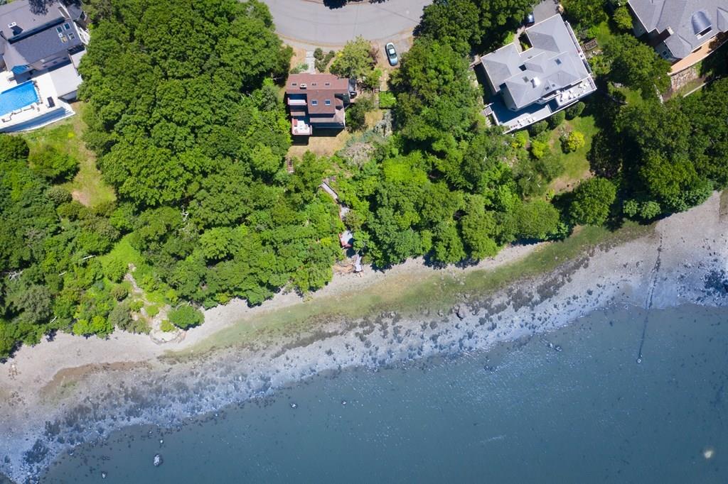 50 Pinecliff Drive Marblehead, MA 01945 - Photo 5 of 41 an aerial view of a house with a yard and outdoor seating
