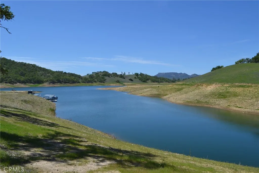 4772 Mallard Paso Robles, CA 93446 - Photo 13 of 20 a view of a lake with a mountain in the background