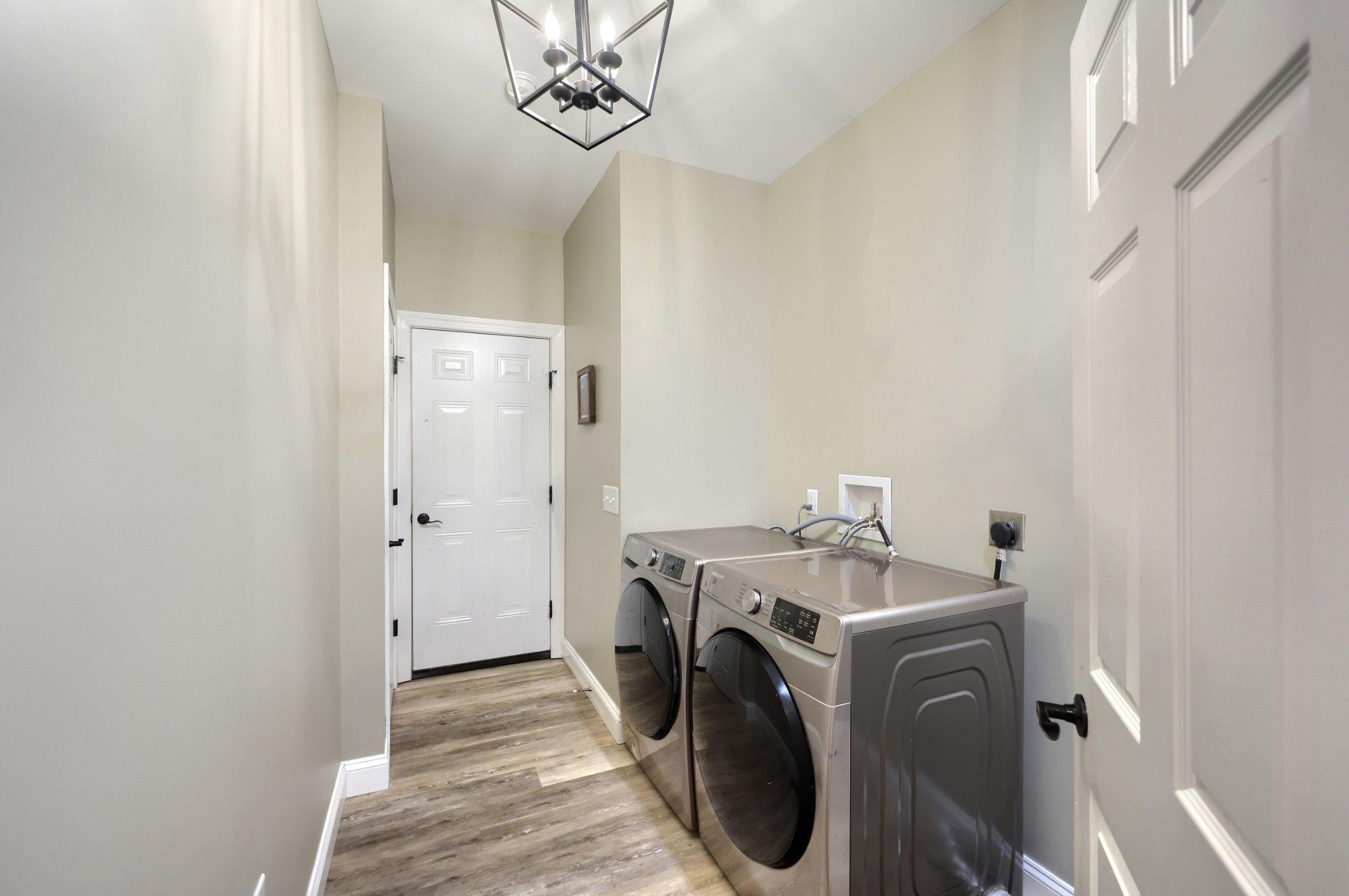 305 Gun Club Road New Oxford, PA 17350 - Photo 23 of 56 Laundry, half bath, mudroom coming from garage.
