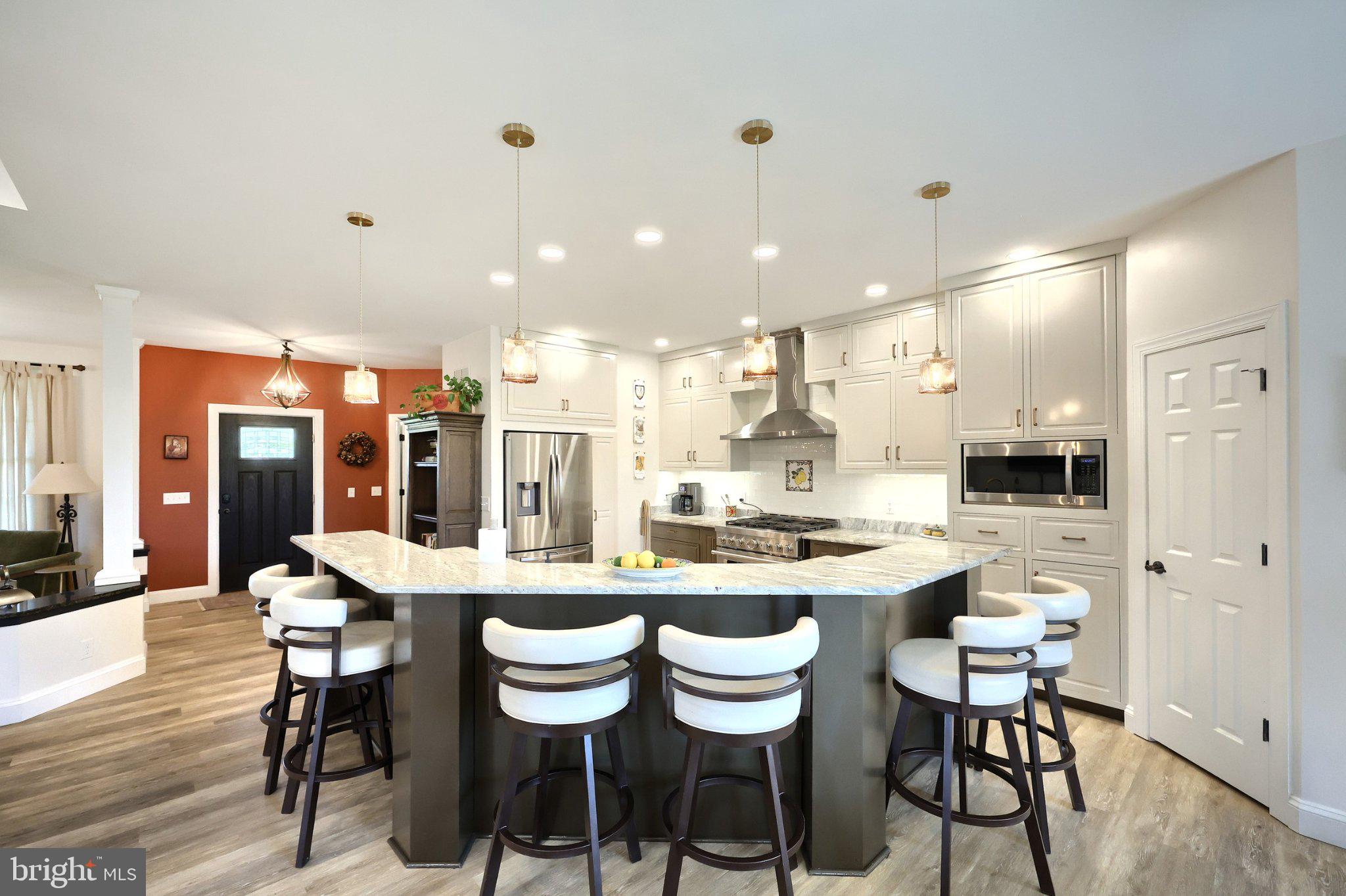 305 Gun Club Road New Oxford, PA 17350 - Photo 25 of 56 Modern kitchen with stylish island seating.