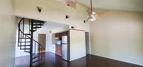 a view of entryway with wooden floor