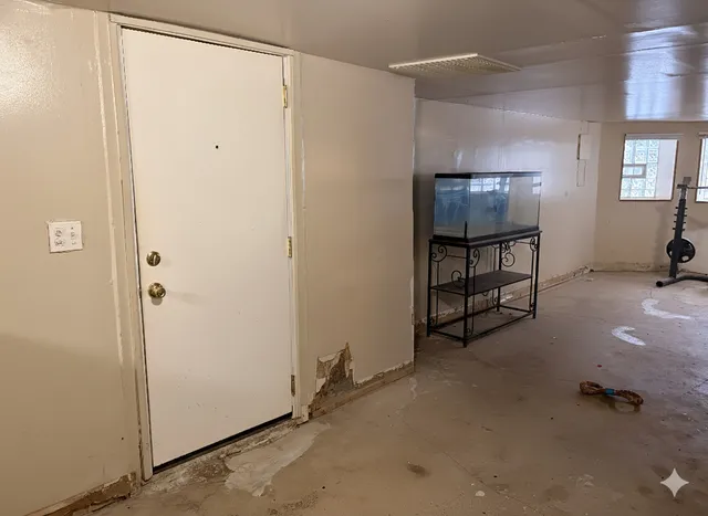 a bathroom with a sink toilet and mirror