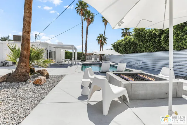 a view of a terrace with a tree