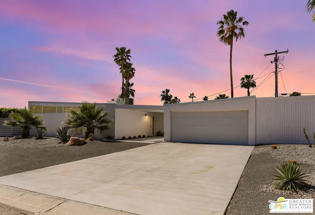 a view of a backyard of the house