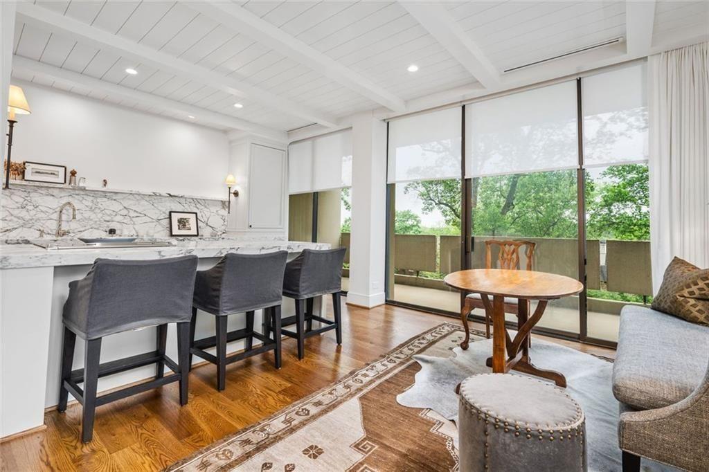 2575 Peachtree Road, Unit 8D Atlanta, GA 30305 - Photo 4 of 14 a view of a dining room with furniture window and outside view
