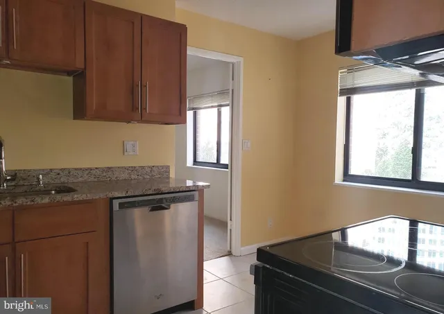 a kitchen with a stove and a microwave