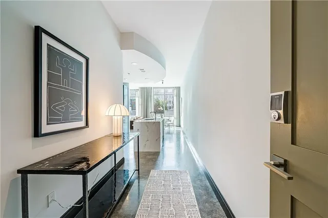 a kitchen with stainless steel appliances a stove and cabinets