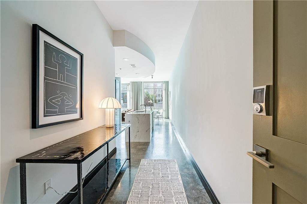 a kitchen with stainless steel appliances a stove and cabinets