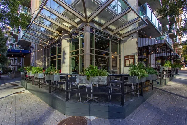 a view of a chairs and table in a patio