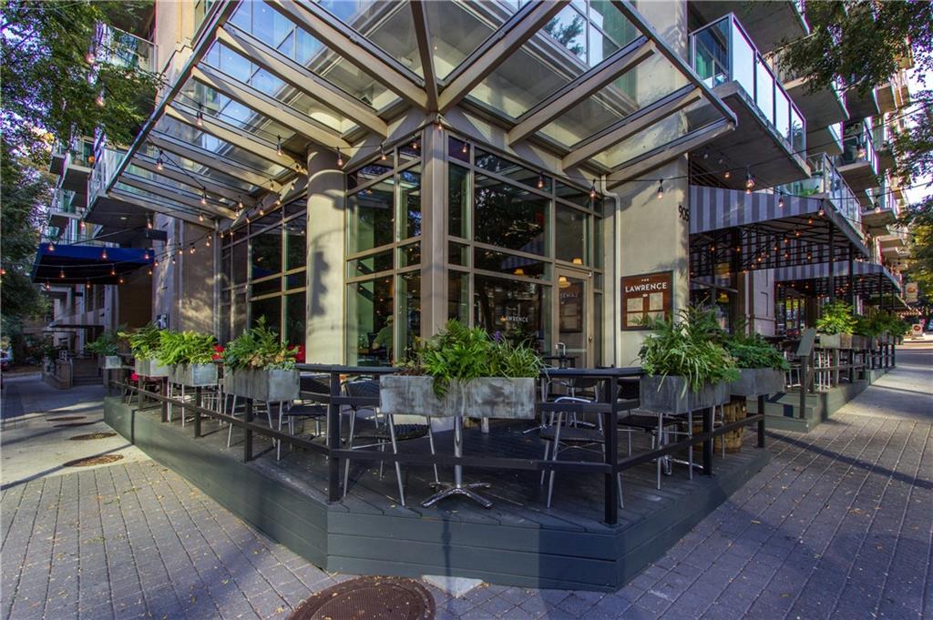 905 Juniper Street Northeast, Unit 405 Atlanta, GA 30309 - Photo 30 of 34 a view of a chairs and table in a patio