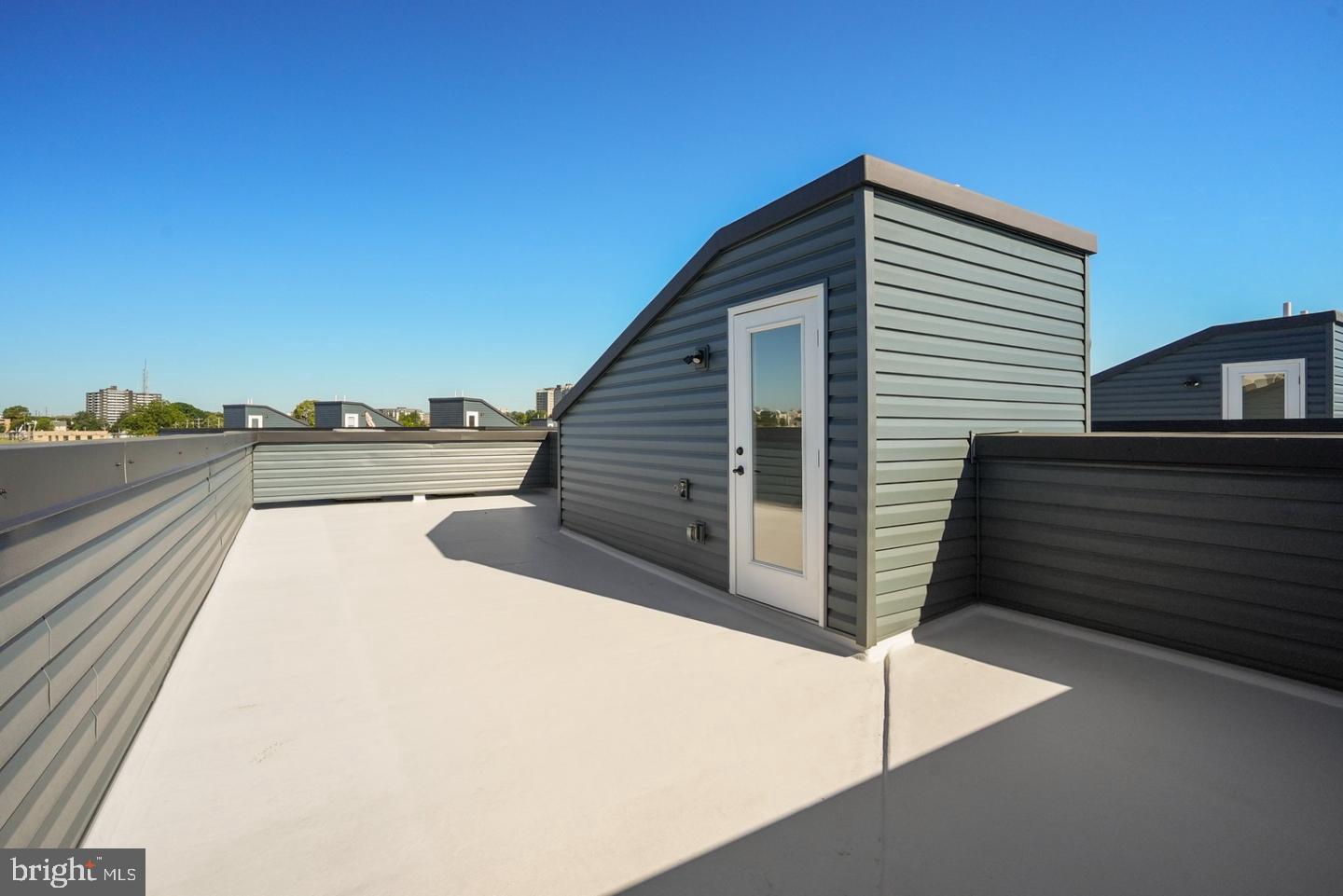 2709 Priya, Unit A76 Philadelphia, PA 19131 - Photo 24 of 29 Modern rooftop retreat with skyline views.