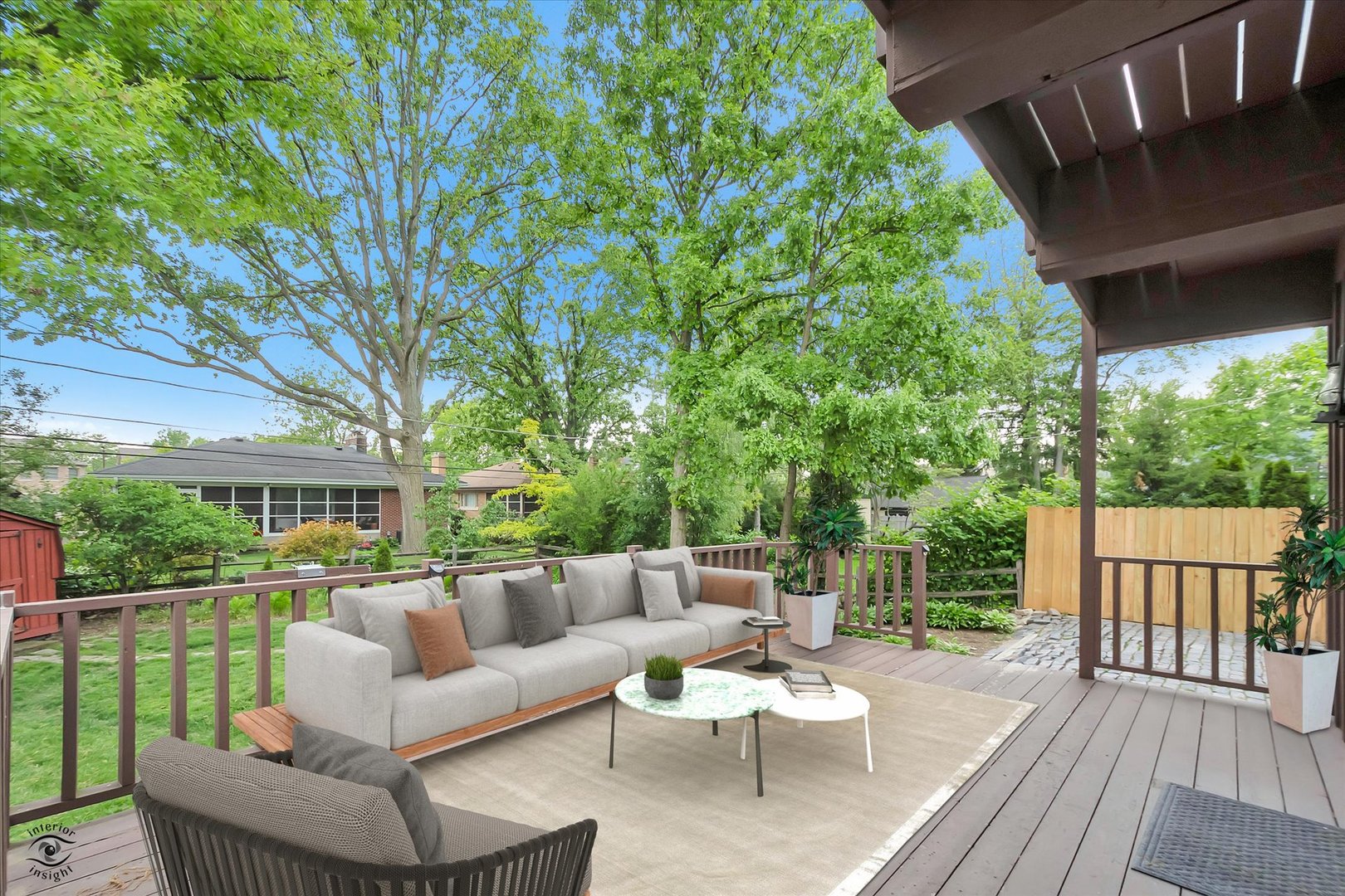 920 Juniper Road Glenview, IL 60025 - Photo 17 of 25 a view of a patio with couches potted plants and wooden floor