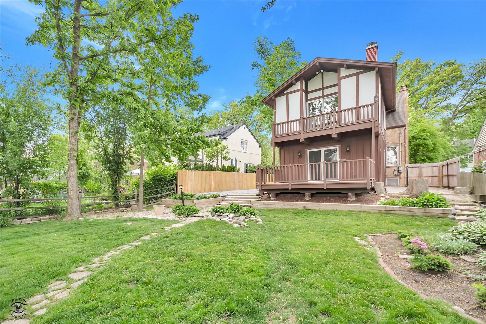 920 Juniper Road Glenview, IL 60025 - Photo 22 of 25 a view of a house with a yard and sitting area