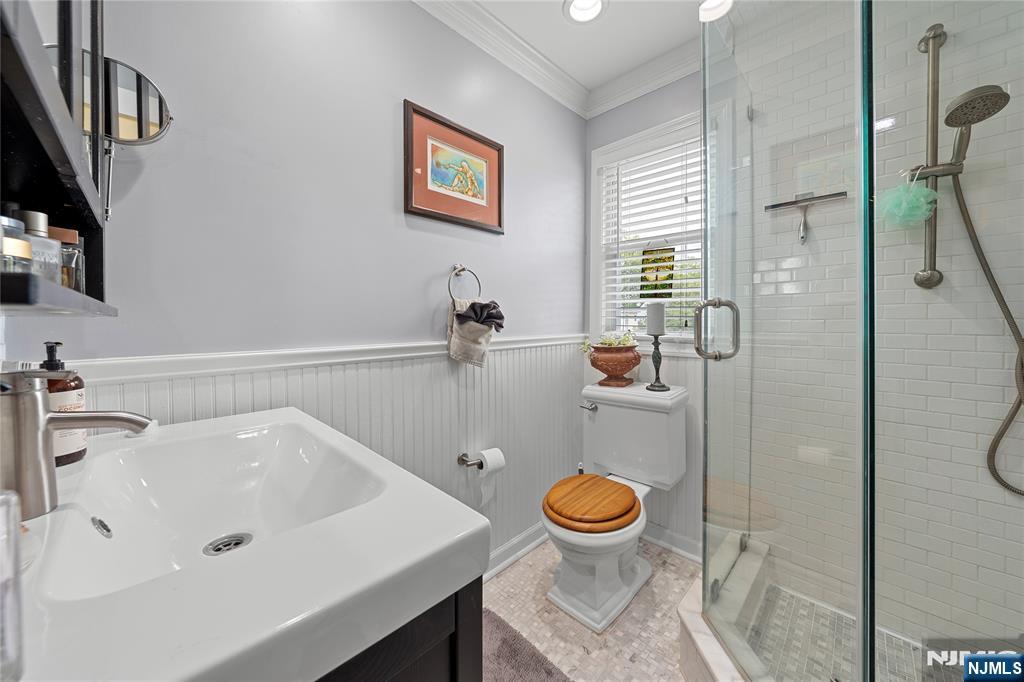 5 Leo Terrace Bloomfield, NJ 07003 - Photo 15 of 32 a bathroom with a sink and a toilet