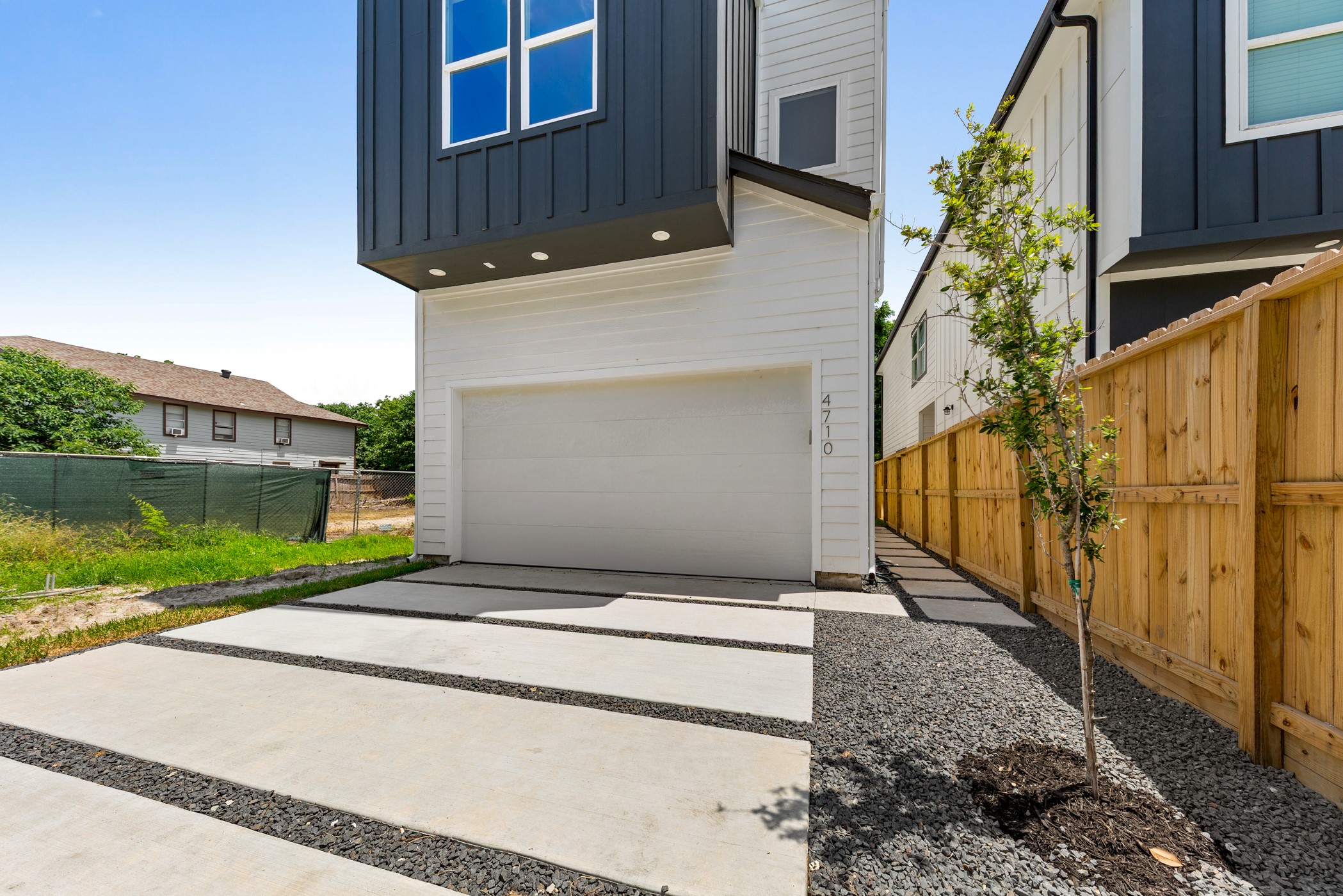 4710 Gunter Street Houston, TX 77020 - Photo 2 of 32 a view of backyard with pathway and small yard
