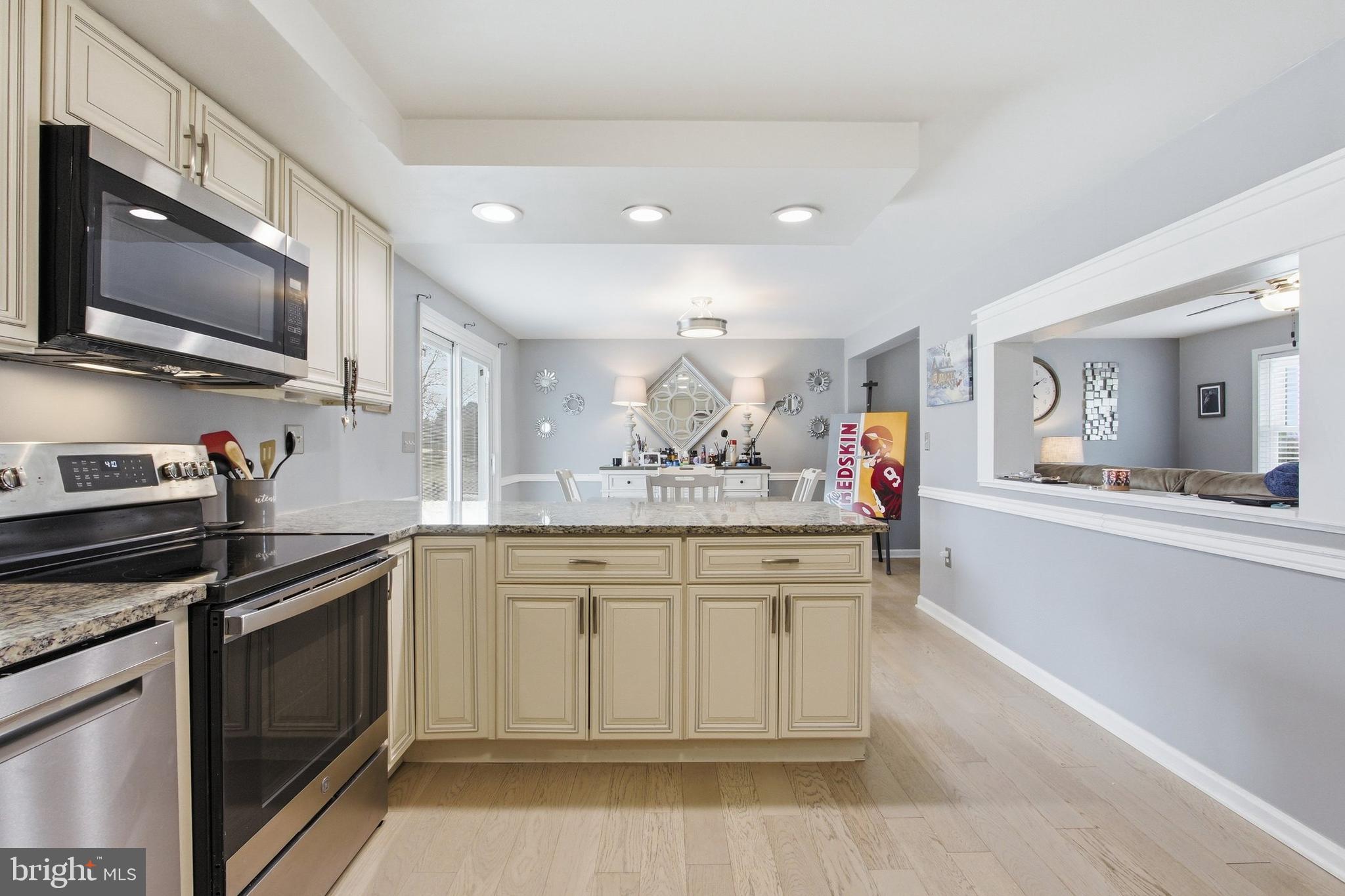 410 Shorbs Hill Road Hanover, PA 17331 - Photo 12 of 33 a kitchen with stainless steel appliances granite countertop a sink and a stove
