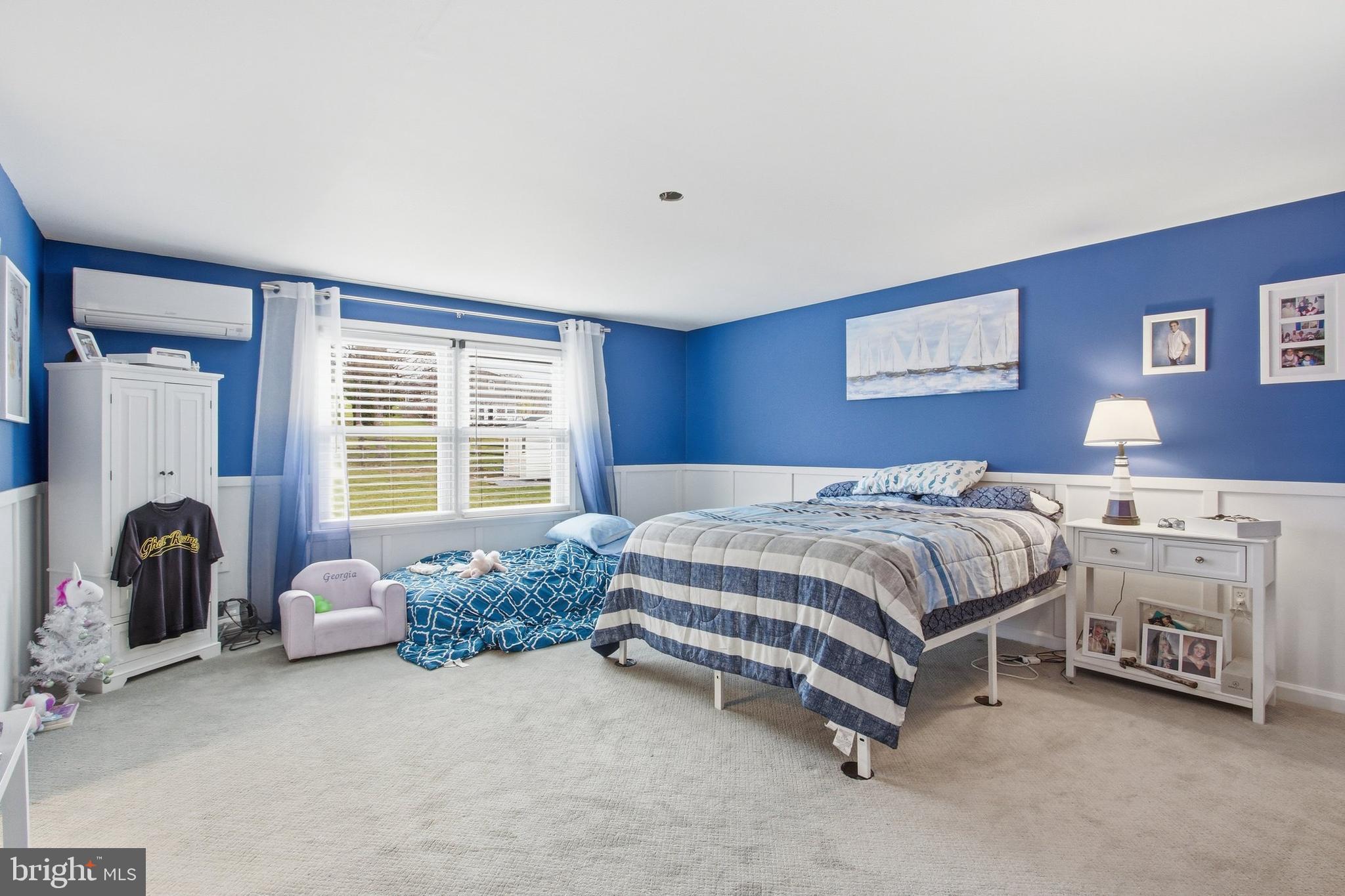 410 Shorbs Hill Road Hanover, PA 17331 - Photo 14 of 33 a bedroom with a bed and a couch