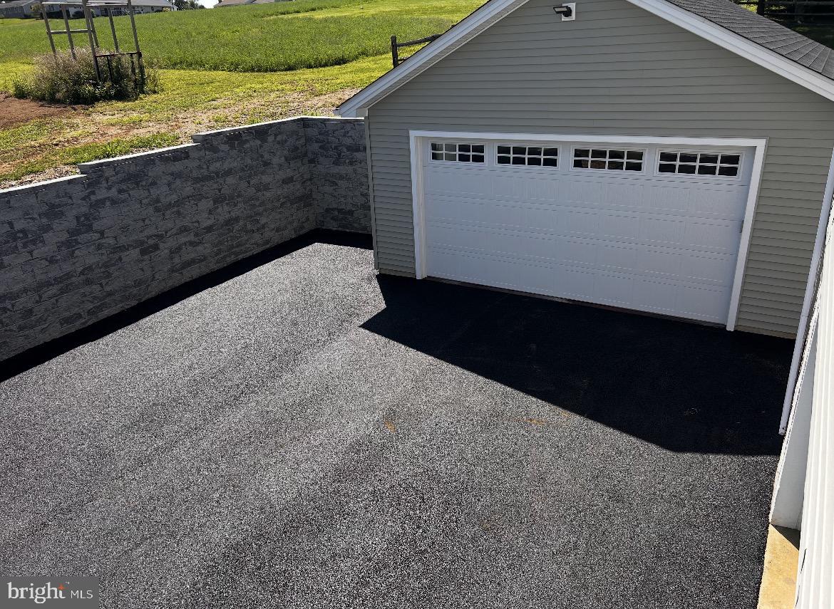410 Shorbs Hill Road Hanover, PA 17331 - Photo 2 of 33 a black car parked in front of a house
