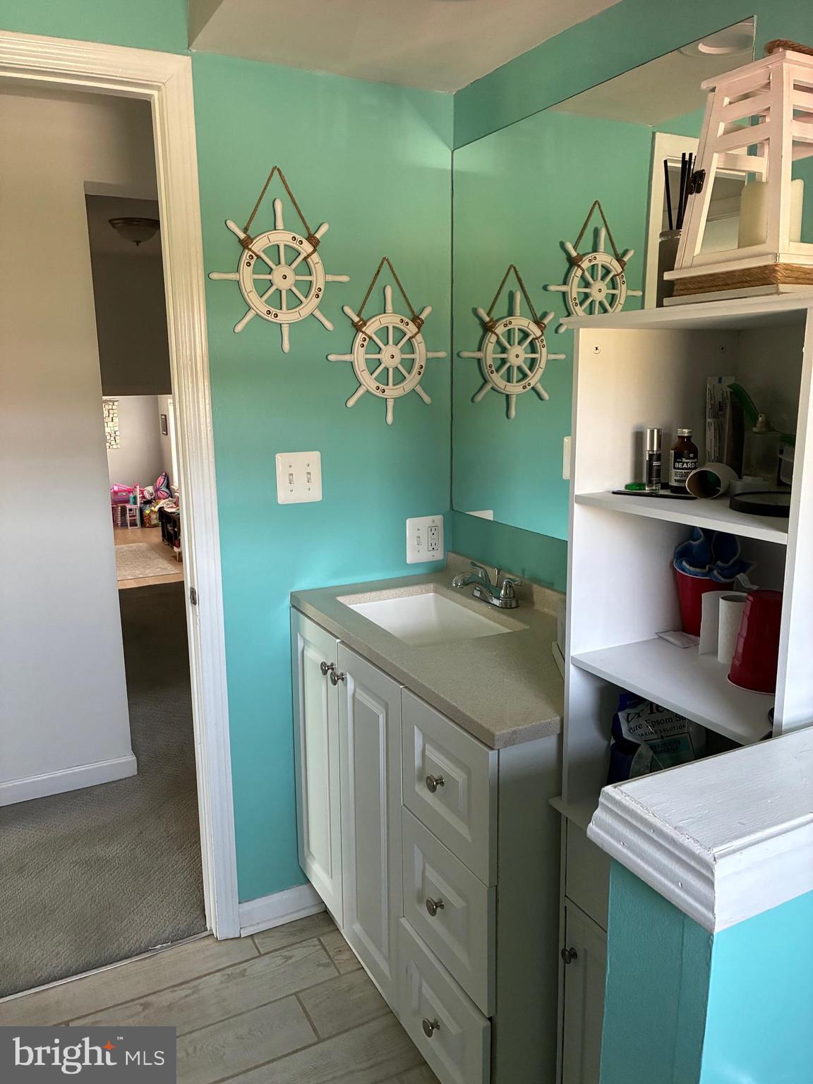 410 Shorbs Hill Road Hanover, PA 17331 - Photo 21 of 33 a bathroom with a sink and a mirror