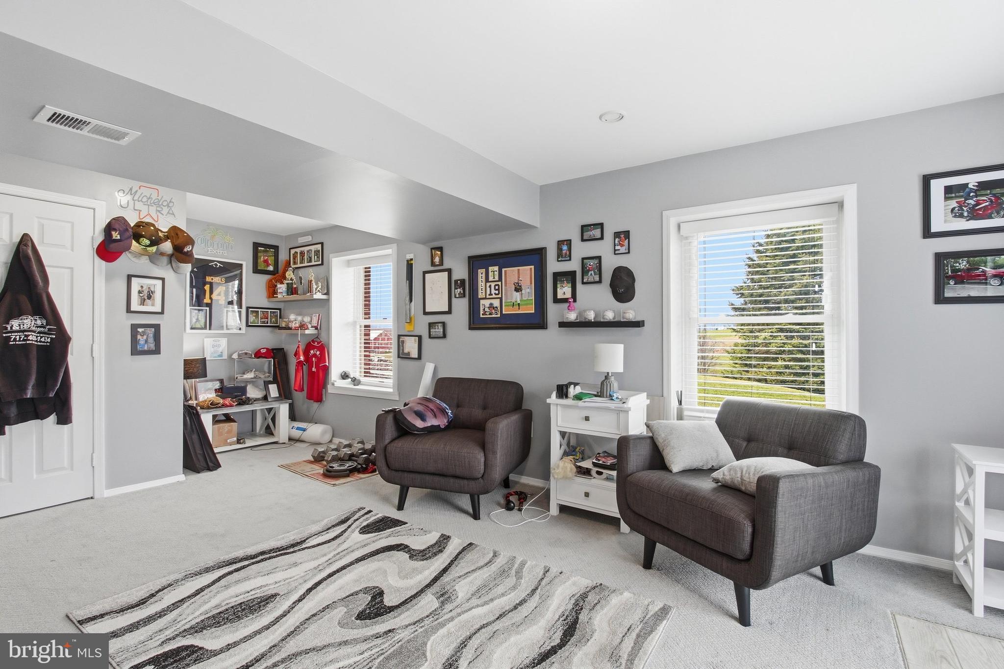410 Shorbs Hill Road Hanover, PA 17331 - Photo 25 of 33 a living room with furniture and a flat screen tv