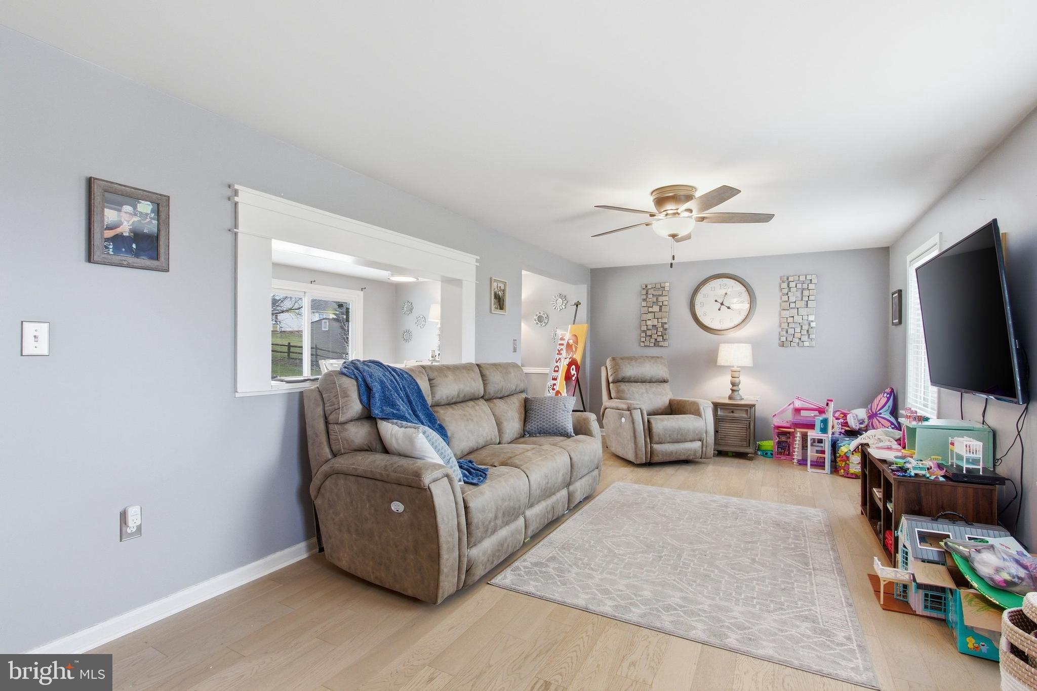 410 Shorbs Hill Road Hanover, PA 17331 - Photo 3 of 33 a living room with furniture and a flat screen tv