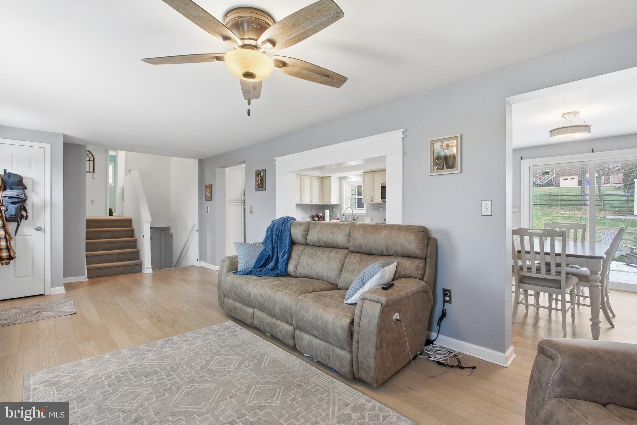 410 Shorbs Hill Road Hanover, PA 17331 - Photo 4 of 33 a living room with furniture and a chandelier