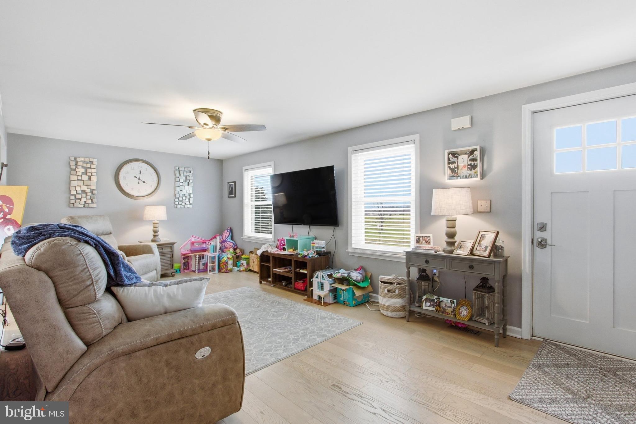 410 Shorbs Hill Road Hanover, PA 17331 - Photo 6 of 33 a living room with furniture and a flat screen tv