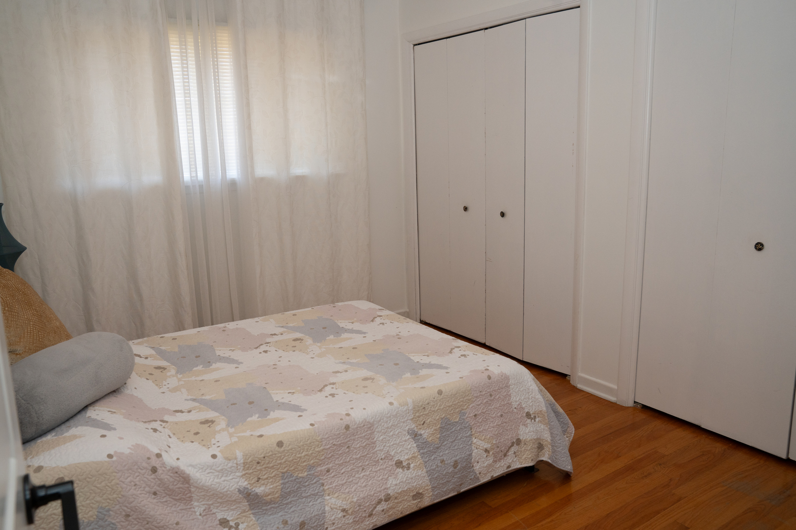 214 South Mt Prospect Road Mount Prospect, IL 60056 - Photo 16 of 25 a large bed in a bedroom next to a window