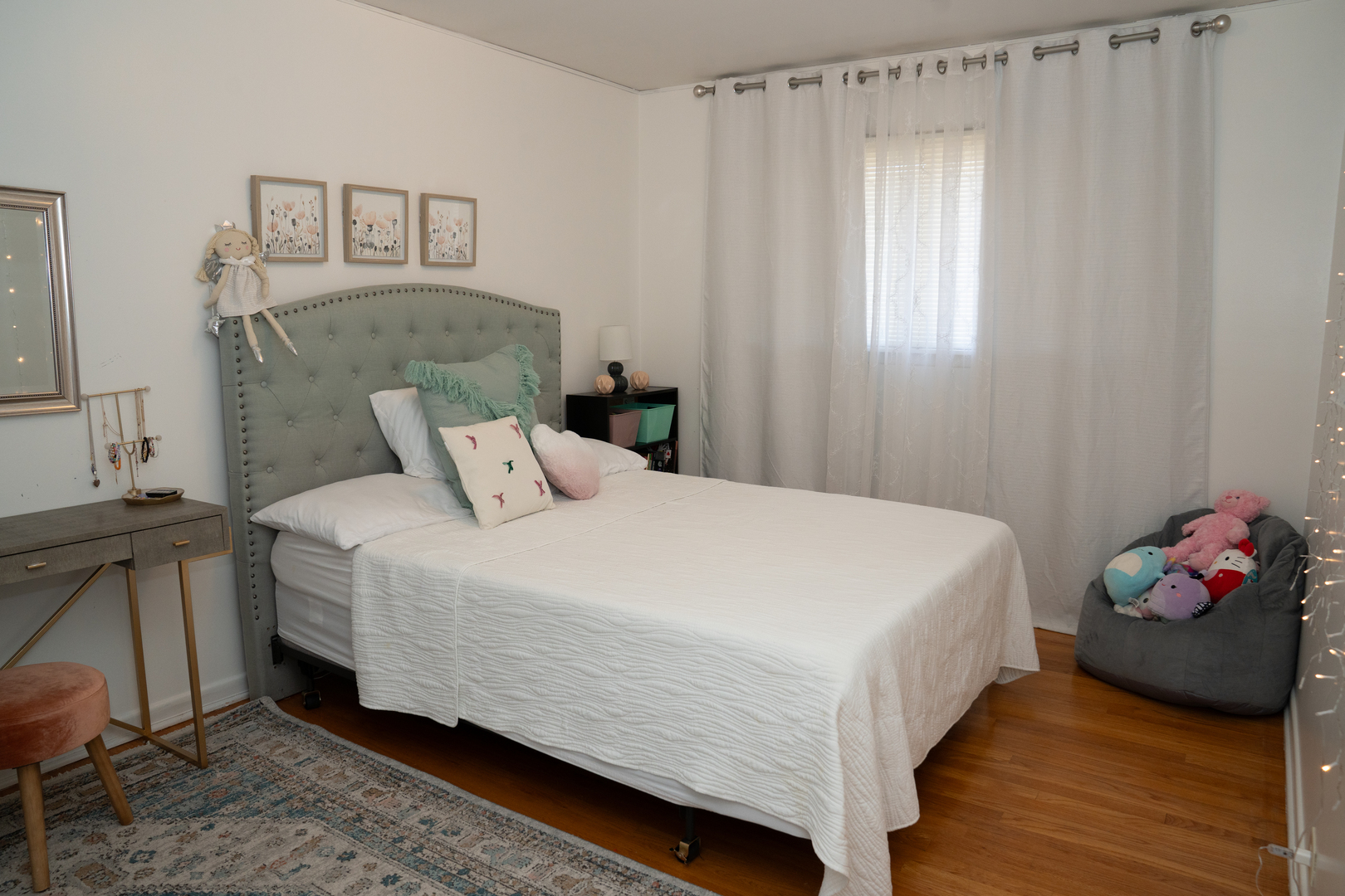 214 South Mt Prospect Road Mount Prospect, IL 60056 - Photo 17 of 25 a bedroom with a bed and window