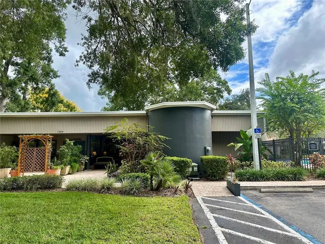 a view of a garden with a fountain