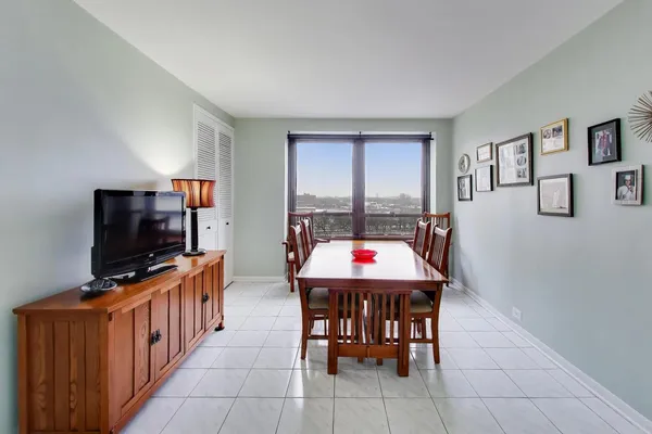 a room with furniture and flat screen tv