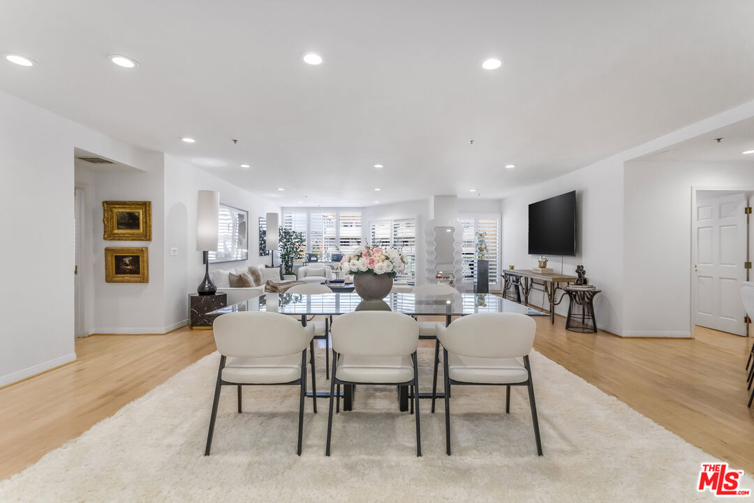 10724 Wilshire Boulevard, Unit 1005 Los Angeles, CA 90024 - Photo 3 of 45 a view of a dining room with furniture