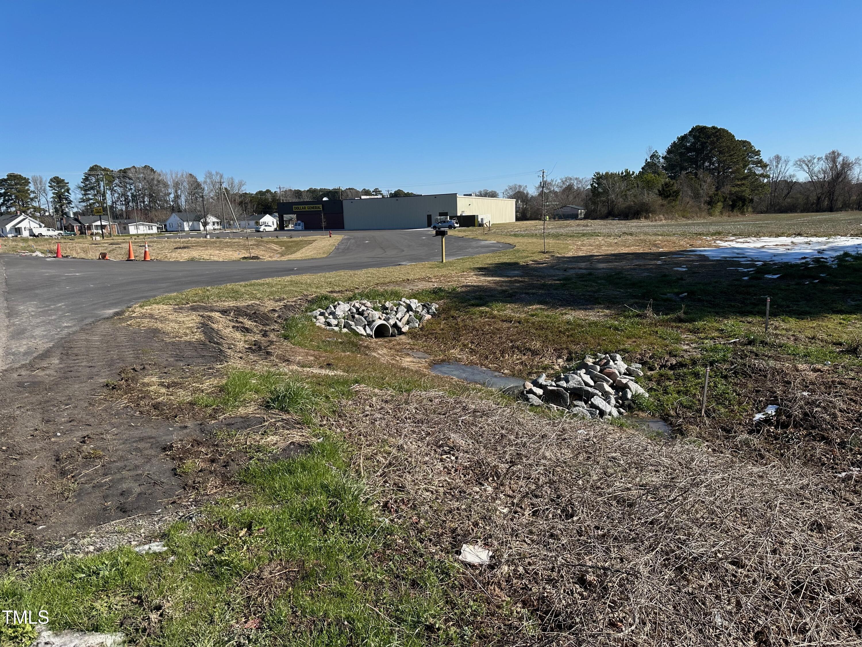 1091 Prison Camp Road Williamston, NC 27892 - Photo 3 of 8 a view of a road with an ocean view