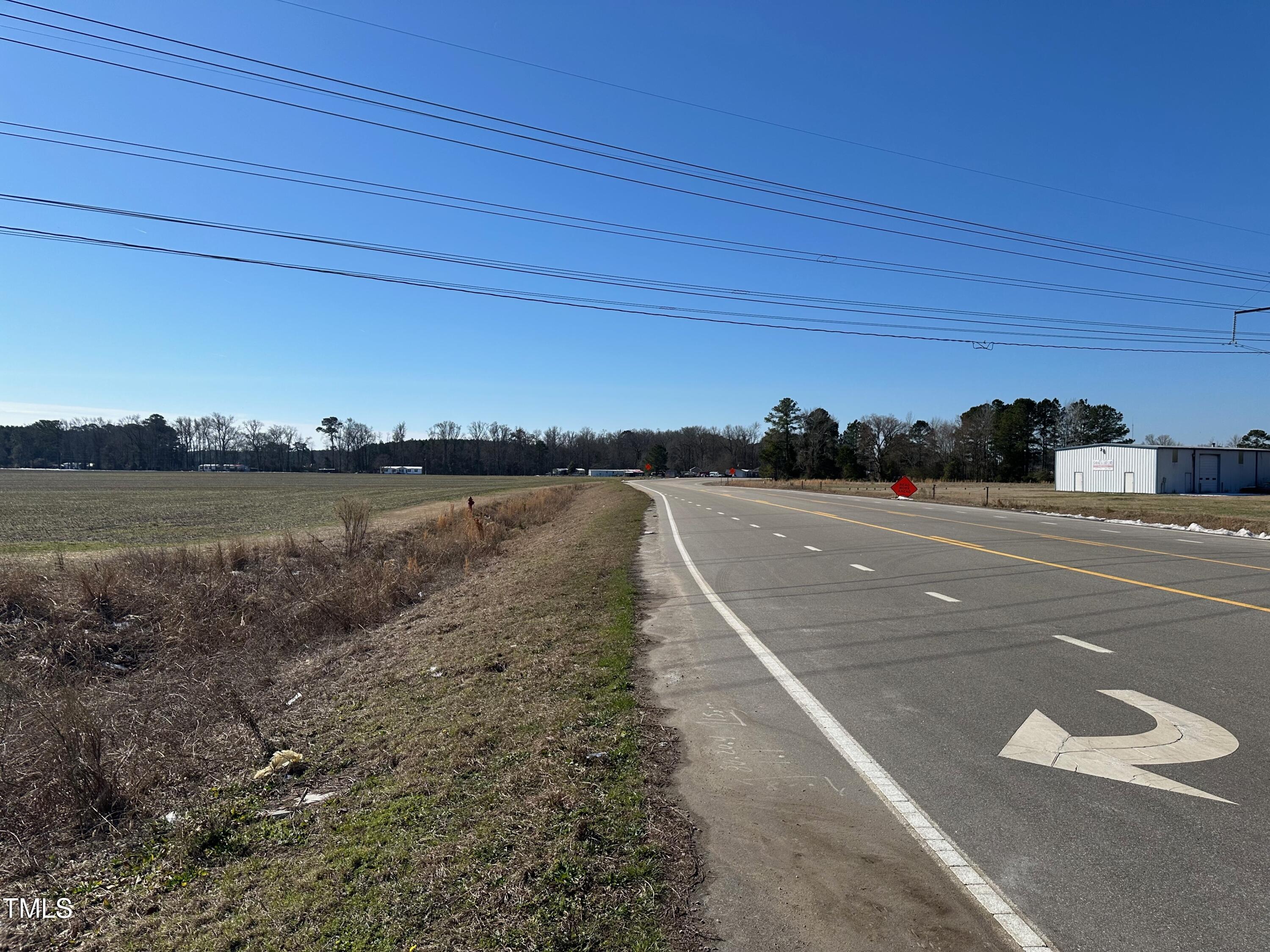 1091 Prison Camp Road Williamston, NC 27892 - Photo 6 of 8 a view of a lake with a outdoor space
